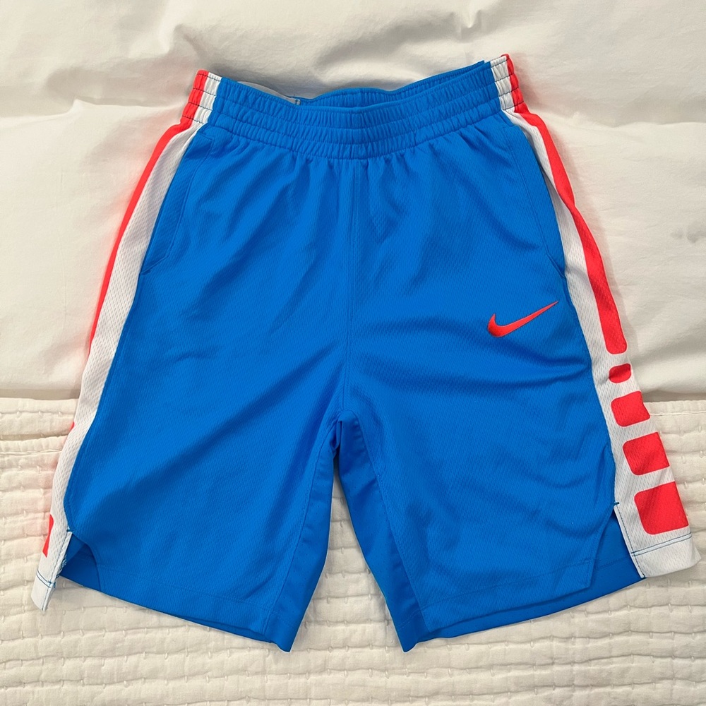 Kids Nike basketball shorts! Kids size large. Color- blue, orange, white.